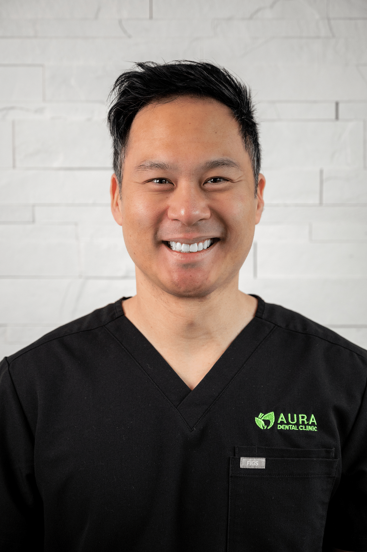 Dr Jesh smiling with Aura Dental Clinic