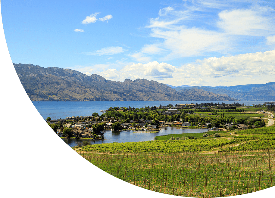 A circular frame showcases a scenic view of a lake surrounded by mountains