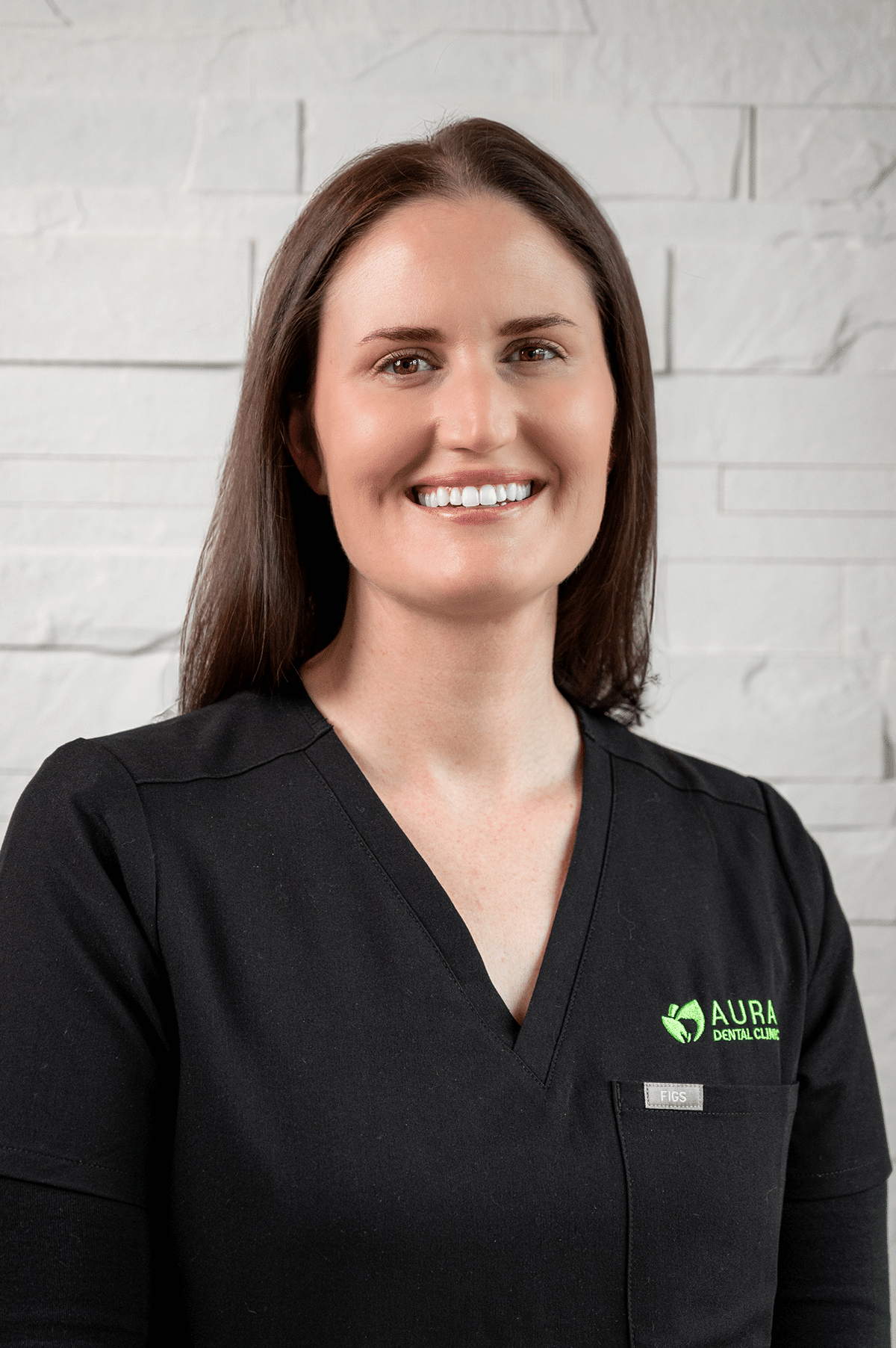 A woman wearing a black shirt and green shirt stands in front of Aura Dental Clinic, labeled 'Kate'.