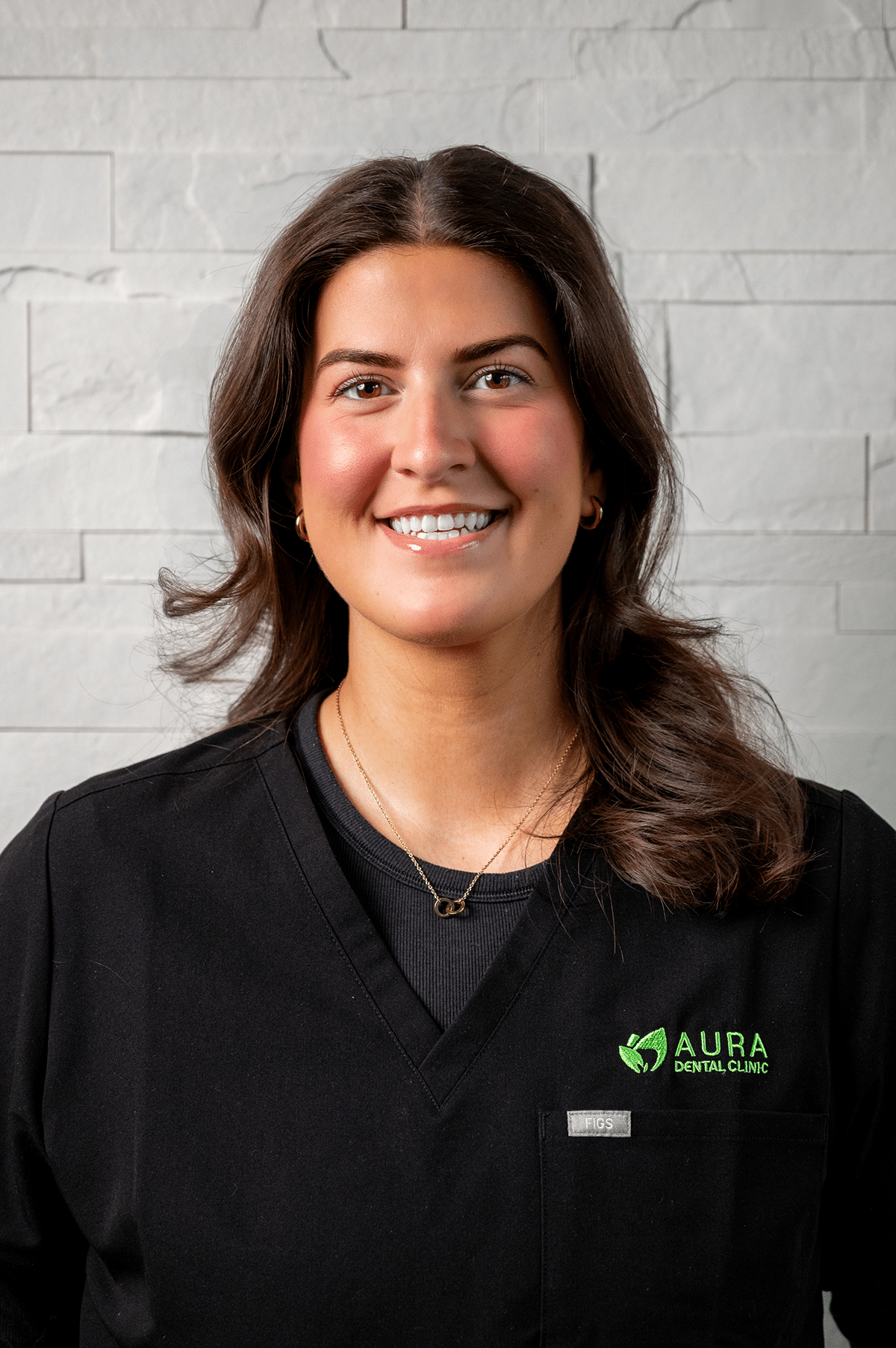 A woman wearing a black shirt and green shirt stands in front of Aura Dental Clinic, labeled 'Leeza'.